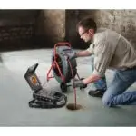 Plumber Using Sewer And Drain Camera