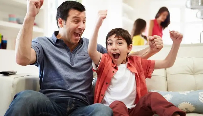 A boy with his dad enjoying the indoor air quality