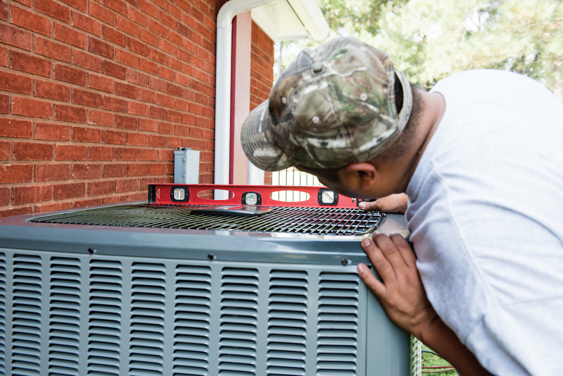 Ac Replacement With Techncian Leveling Outdoor Condenser
