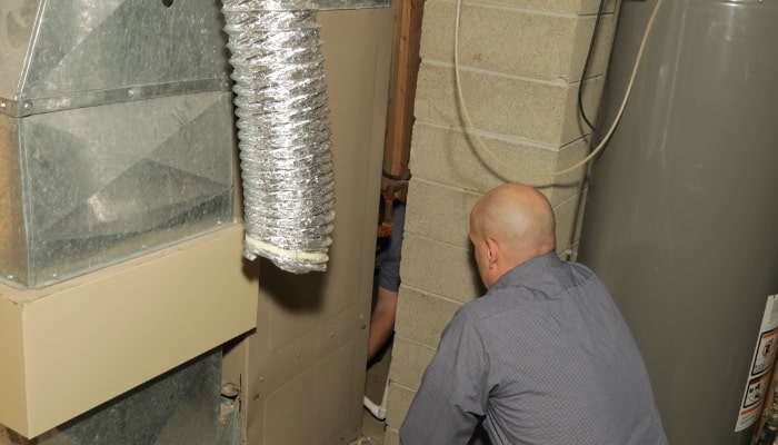Pdm Technicians Working On Air Ducts