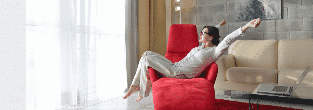 Woman Relaxing On Couch Pdm 1024x360 1